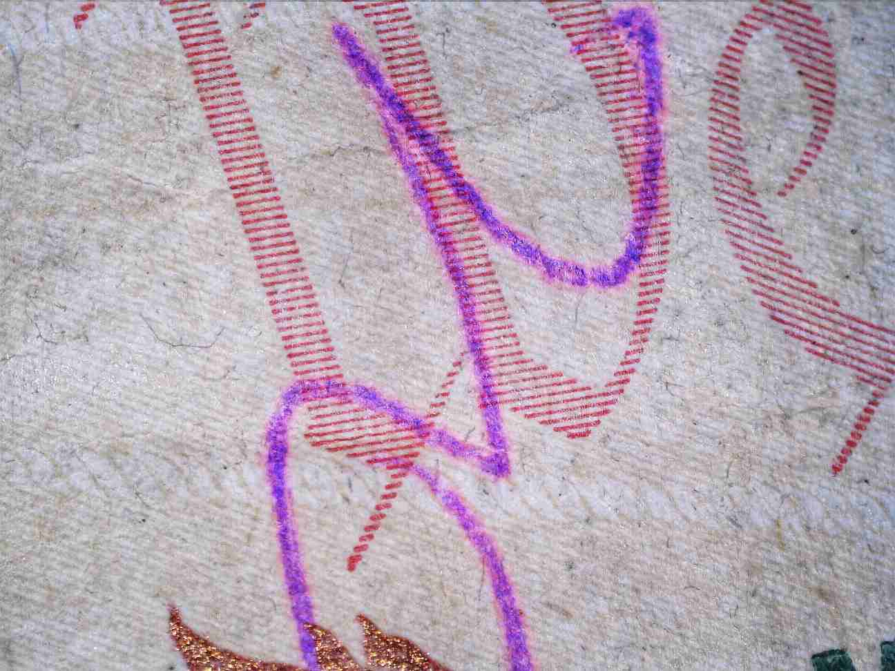 2013-Ten-Dollar-Bill-With-A-Random-Purple-Ink-Spot